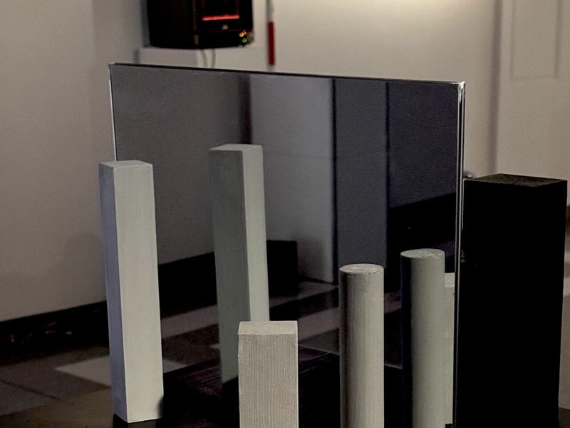 After the Name installation: white blocks before a mirror