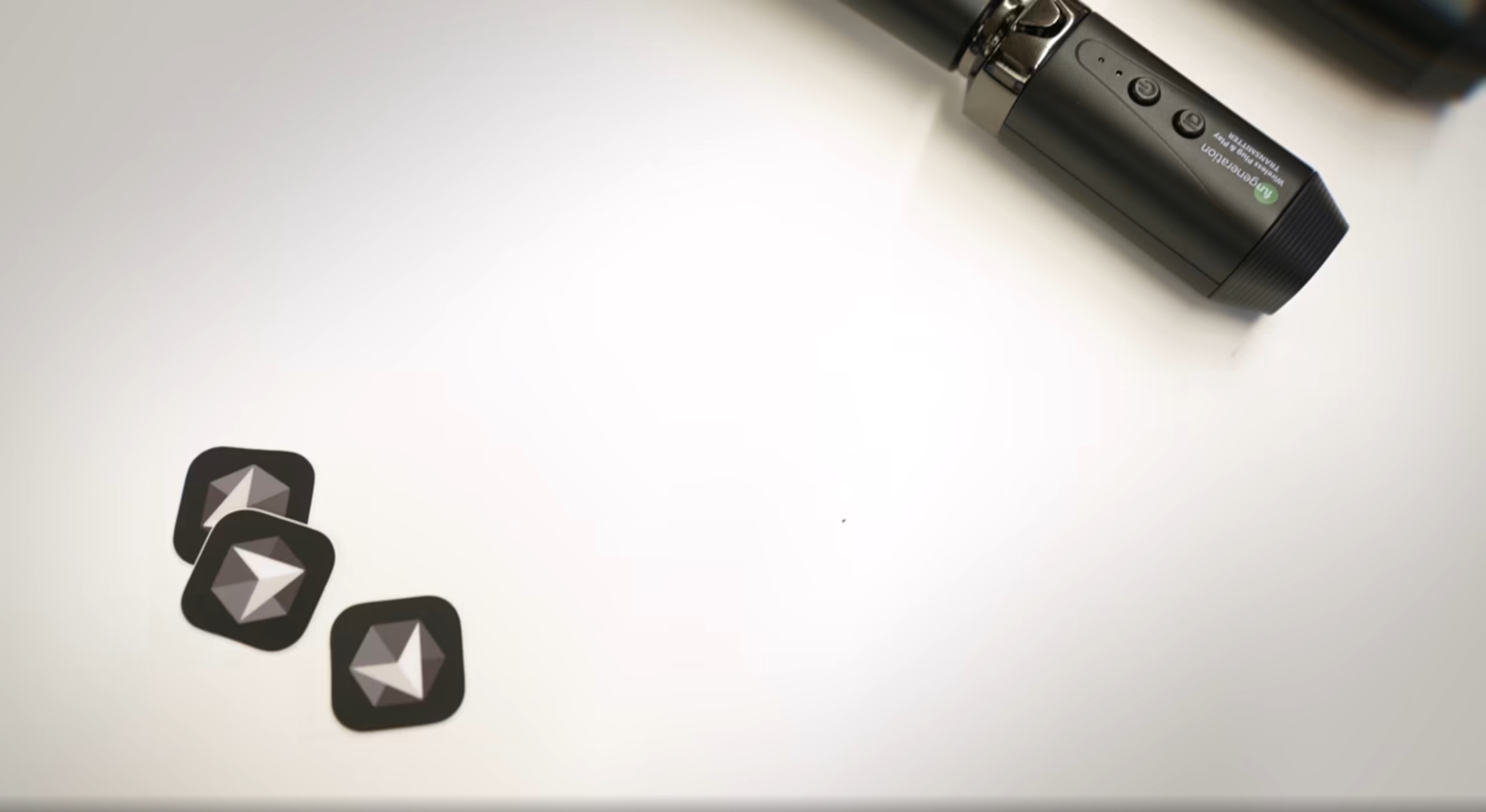 Opening frame of the Cursor Meetup film: Cursor logo tiles beside a microphone