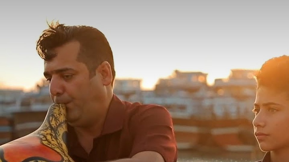Fazel playing the Ney Anban at sunset, from The Voice Within